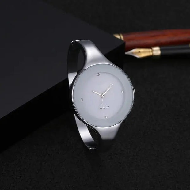 Womens Unique Super Minimal Bracelet Watch - Futuristic Design with Round Minimal Dial Face with No Numbers, Stainless Steel Band Wicked Tender